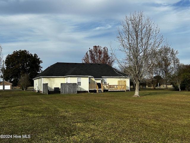 exterior space featuring a yard and a deck