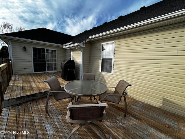 wooden deck featuring grilling area