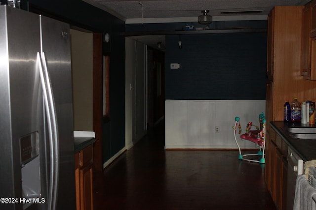 kitchen featuring stainless steel fridge