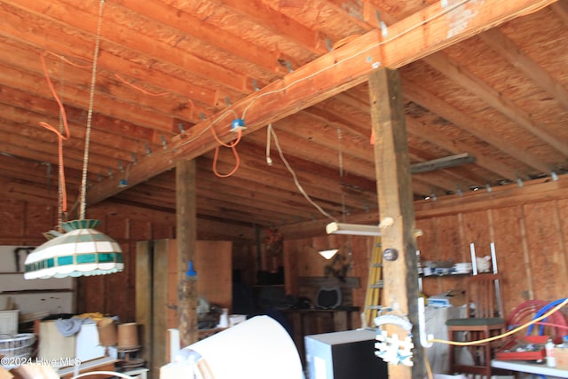 miscellaneous room with lofted ceiling