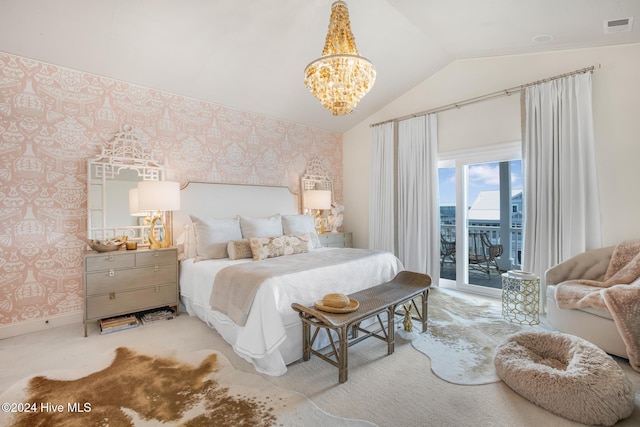 carpeted bedroom with a chandelier, access to outside, and vaulted ceiling