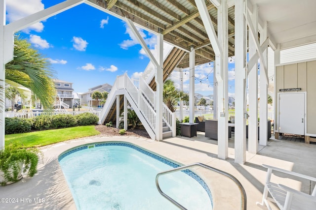 view of swimming pool featuring a patio