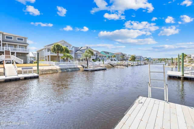 dock area with a water view