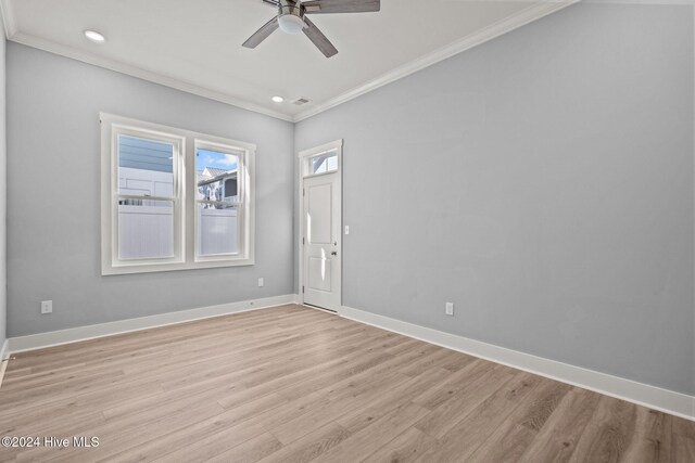 unfurnished bedroom featuring ceiling fan, light hardwood / wood-style floors, and crown molding