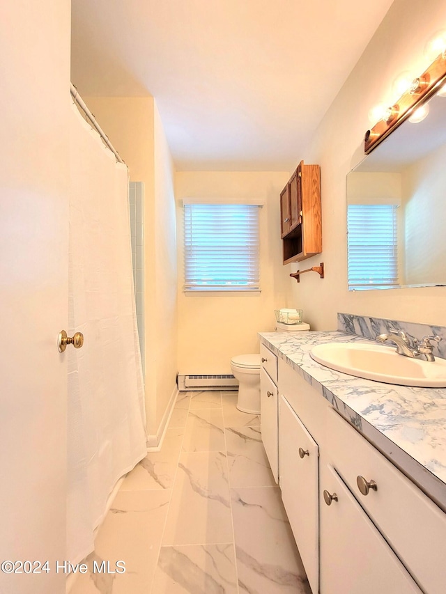 bathroom with walk in shower, toilet, vanity, and a baseboard heating unit