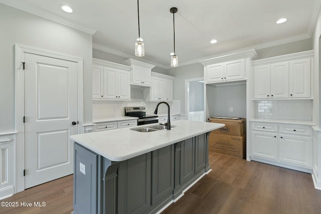 kitchen with electric range, a sink, ornamental molding, and white cabinets