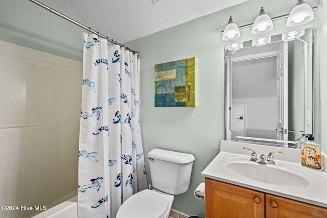 full bathroom featuring shower / bath combination with curtain, vanity, and toilet