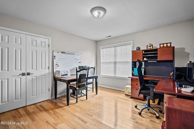 office area with light wood-type flooring