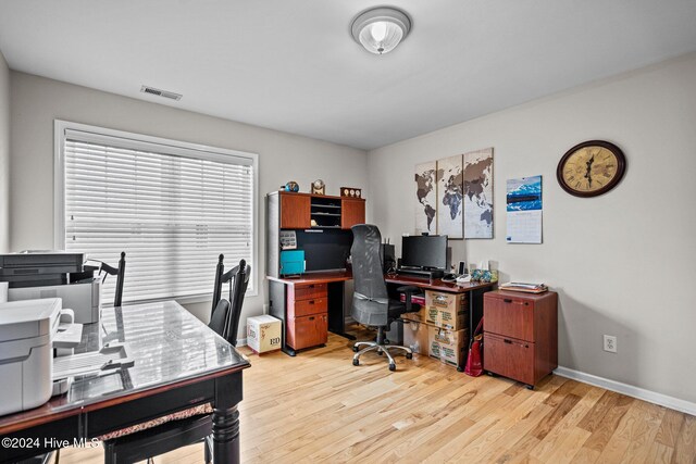 office space featuring light wood-type flooring