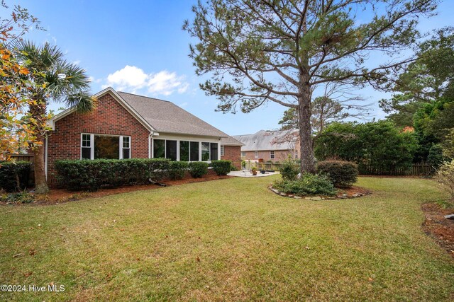 exterior space with a front lawn