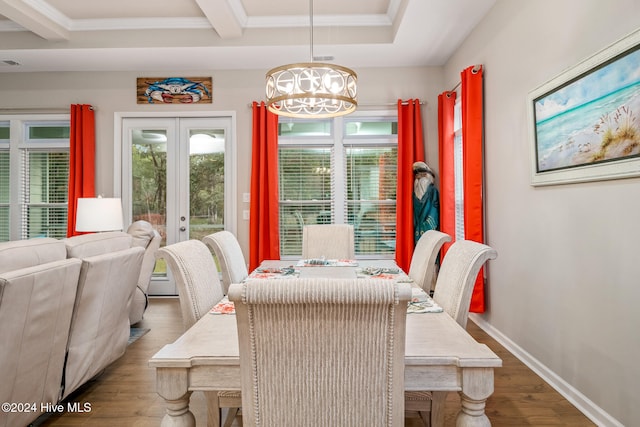 dining room with french doors, beamed ceiling, wood-type flooring, and a notable chandelier