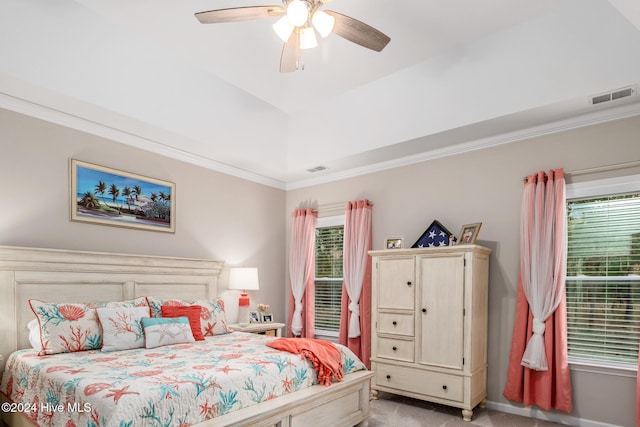 carpeted bedroom with ceiling fan and ornamental molding