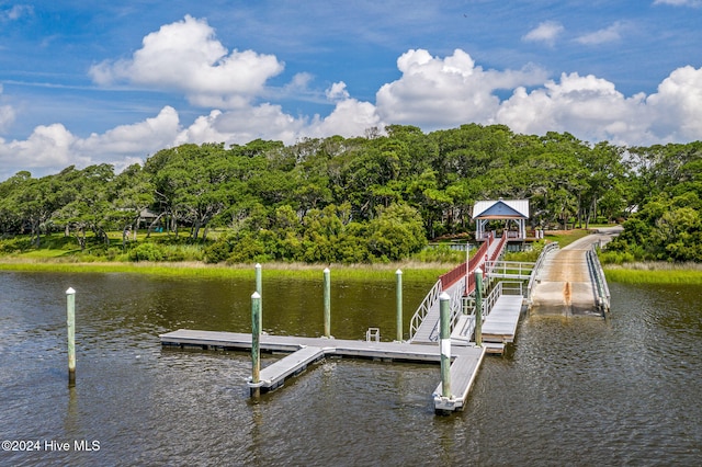 dock area with a gazebo and a water view