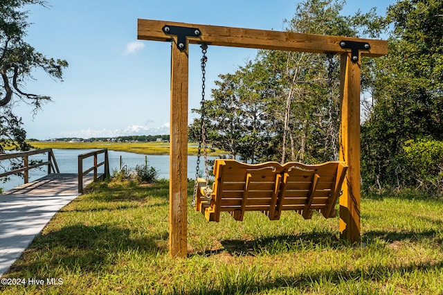 dock area with a water view