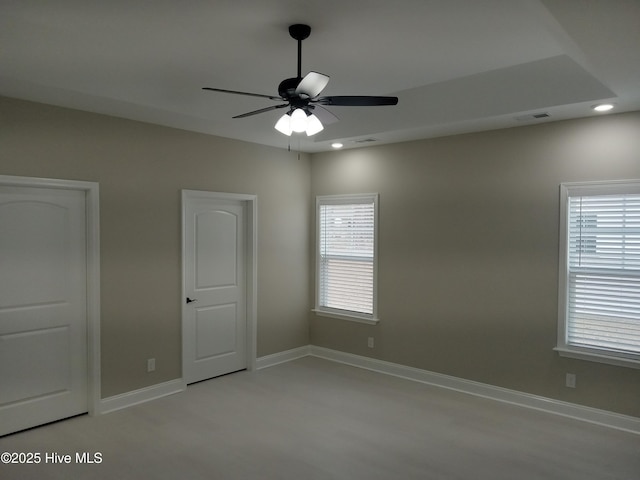 spare room with ceiling fan