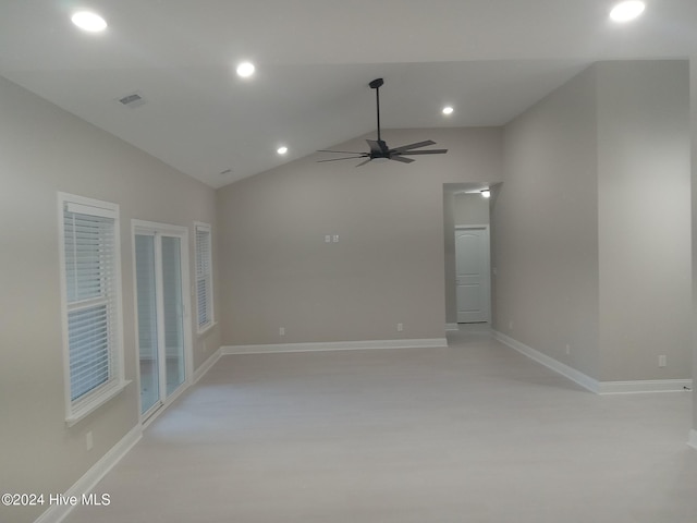 spare room with a ceiling fan, visible vents, baseboards, recessed lighting, and vaulted ceiling