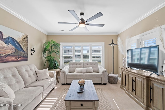 tiled living room with ceiling fan and ornamental molding