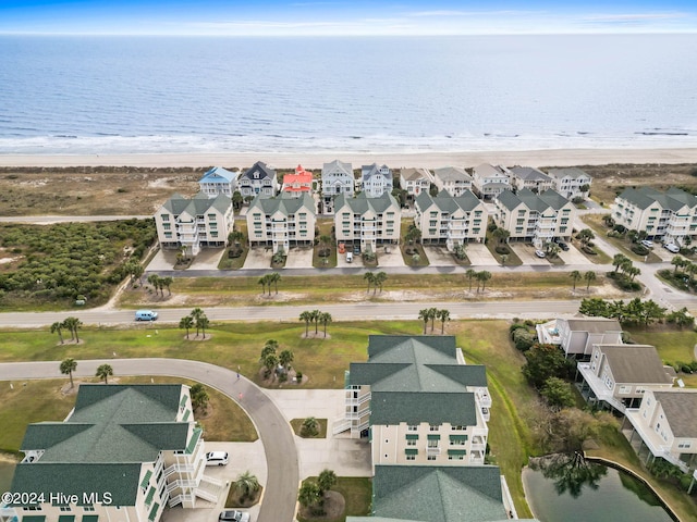 bird's eye view featuring a beach view and a water view