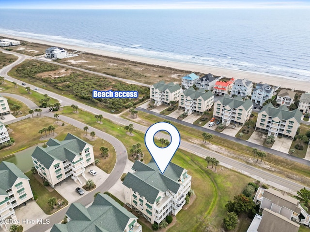 bird's eye view with a beach view and a water view