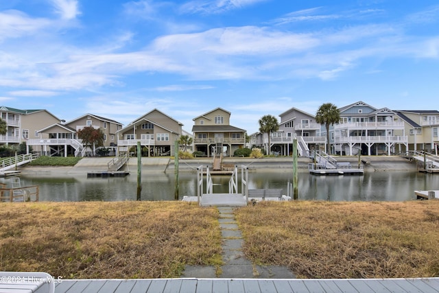 25 Newport St, Ocean Isle Beach, NC 28469 - water view with nearby suburban area and a boat dock