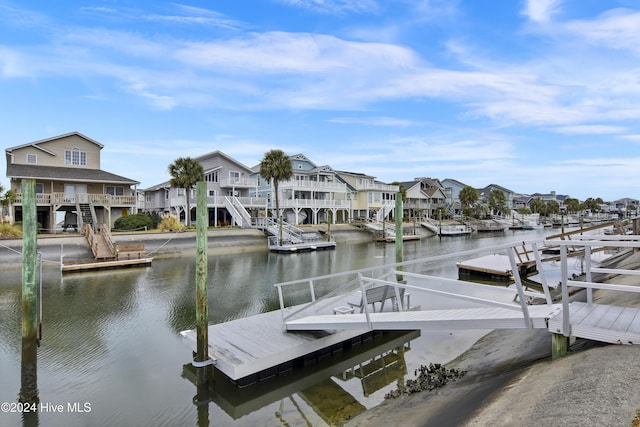 25 Newport St, Ocean Isle Beach, NC 28469 - dock with a water view and a residential view