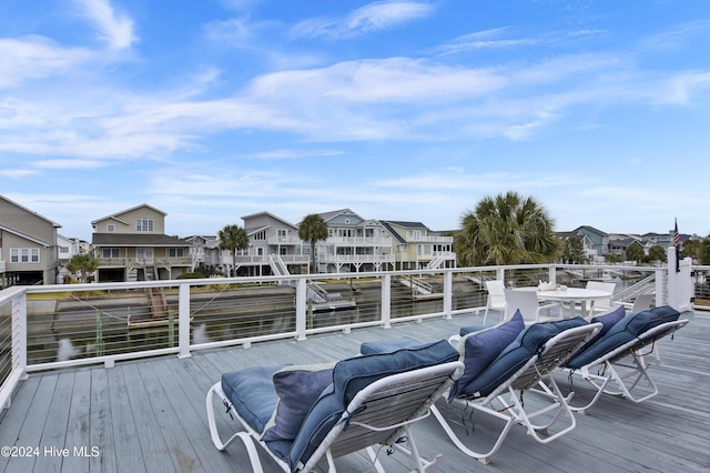 25 Newport St, Ocean Isle Beach, NC 28469 - wooden deck with a residential view
