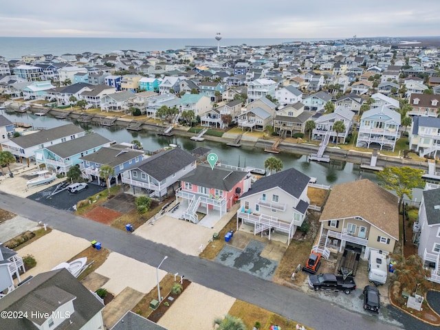 25 Newport St, Ocean Isle Beach, NC 28469 - aerial overview of property's location with a large body of water and nearby suburban area