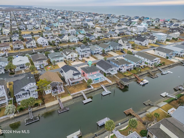 25 Newport St, Ocean Isle Beach, NC 28469 - aerial overview of property's location with a large body of water and nearby suburban area