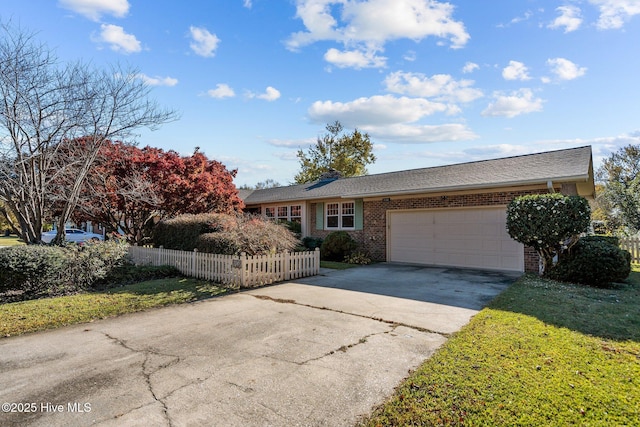 single story home featuring a garage