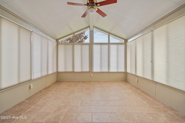 unfurnished sunroom featuring ceiling fan and lofted ceiling