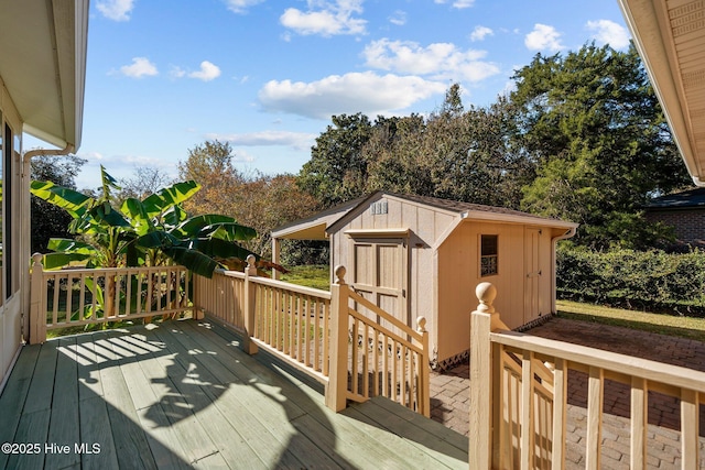 deck featuring a shed