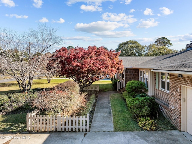 view of yard with a garage