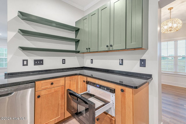 kitchen featuring light hardwood / wood-style flooring, stainless steel dishwasher, crown molding, a chandelier, and decorative light fixtures