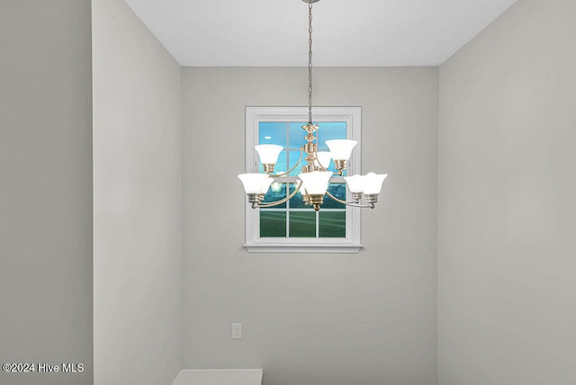 interior space with a notable chandelier