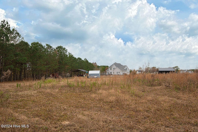 view of yard with a carport