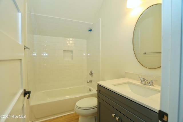 full bathroom featuring bathtub / shower combination, toilet, and vanity