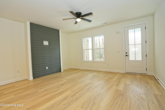 interior space with ceiling fan, light hardwood / wood-style flooring, and a wealth of natural light