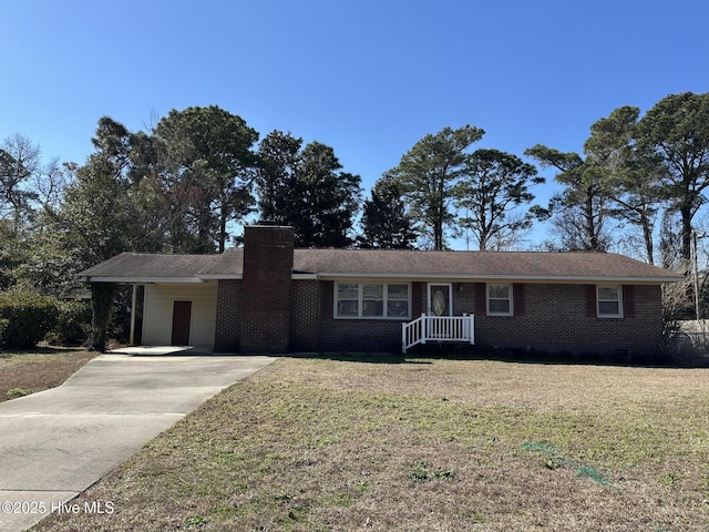 ranch-style house featuring crawl space, a chimney, a front lawn, and brick siding