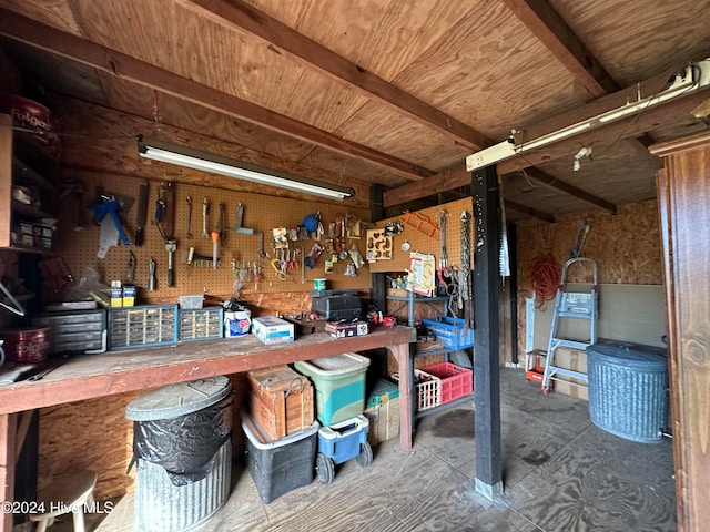 miscellaneous room featuring a workshop area