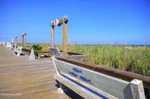 view of dock with a water view