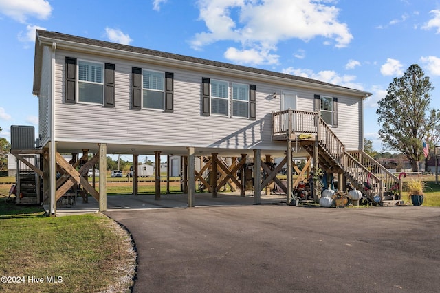 view of front of house with a carport