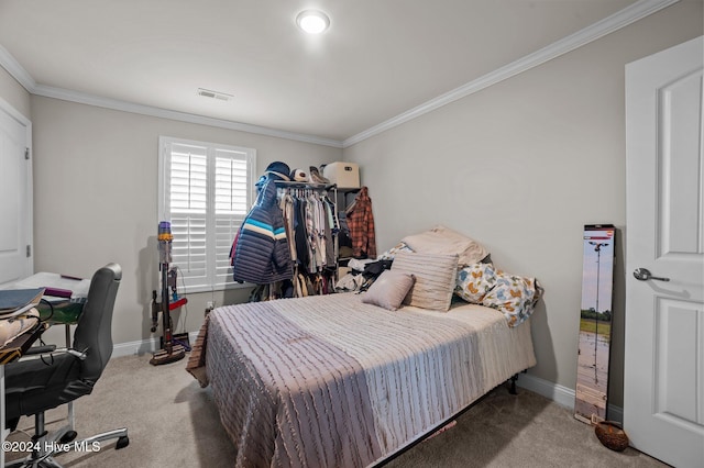 carpeted bedroom with ornamental molding