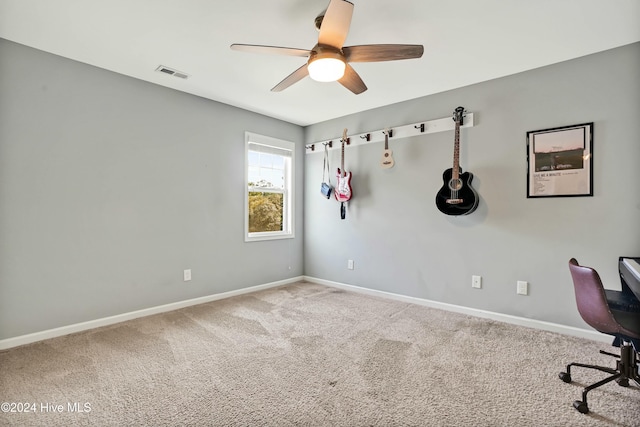 unfurnished office with carpet floors and ceiling fan