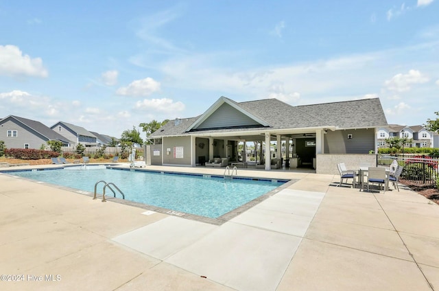 view of swimming pool featuring a patio