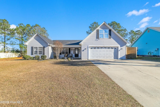 view of front property with a porch, a garage, and a front lawn