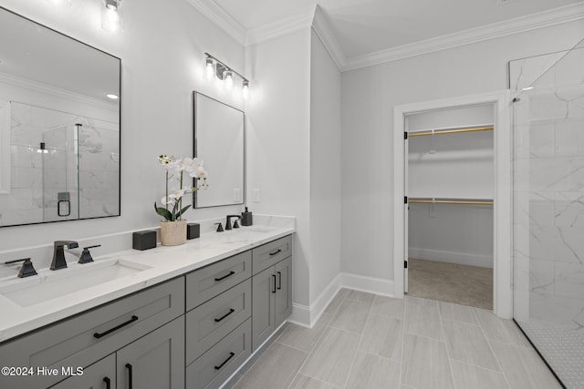 bathroom with vanity, an enclosed shower, and ornamental molding