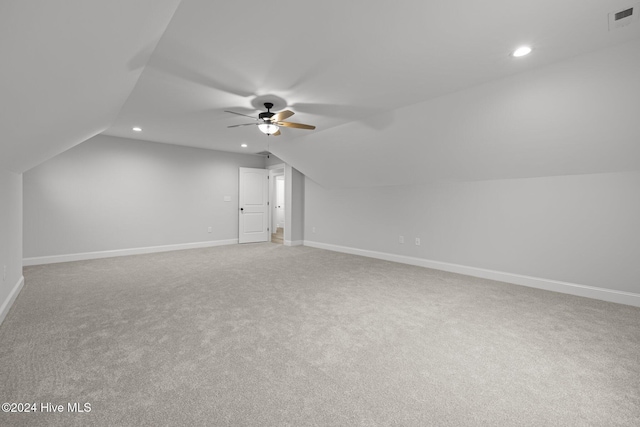 bonus room with carpet flooring, ceiling fan, and lofted ceiling