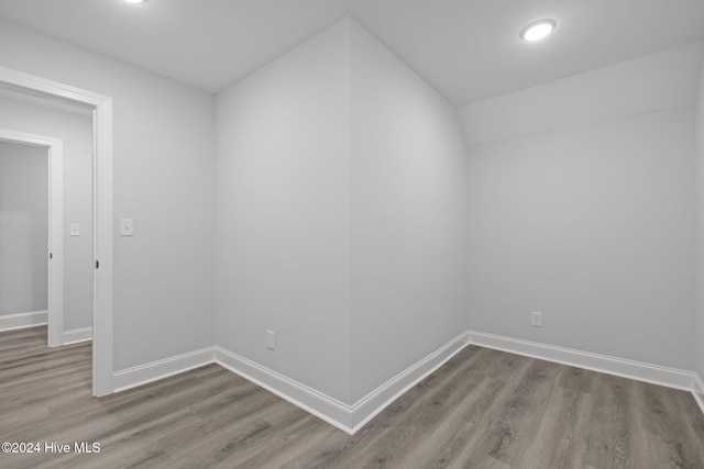 unfurnished room featuring hardwood / wood-style floors