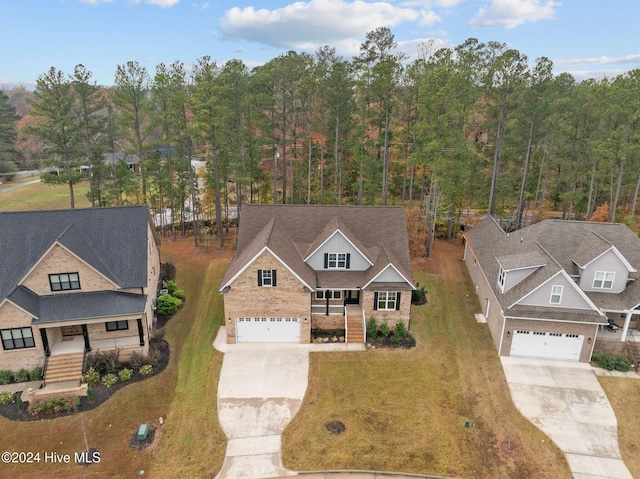 view of front of home featuring a garage and covered porch