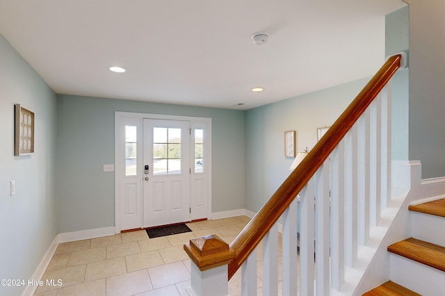 4316 Island Dr, North Topsail Beach, NC 28460 - entrance foyer with stairway, light tile patterned floors, baseboards, and recessed lighting